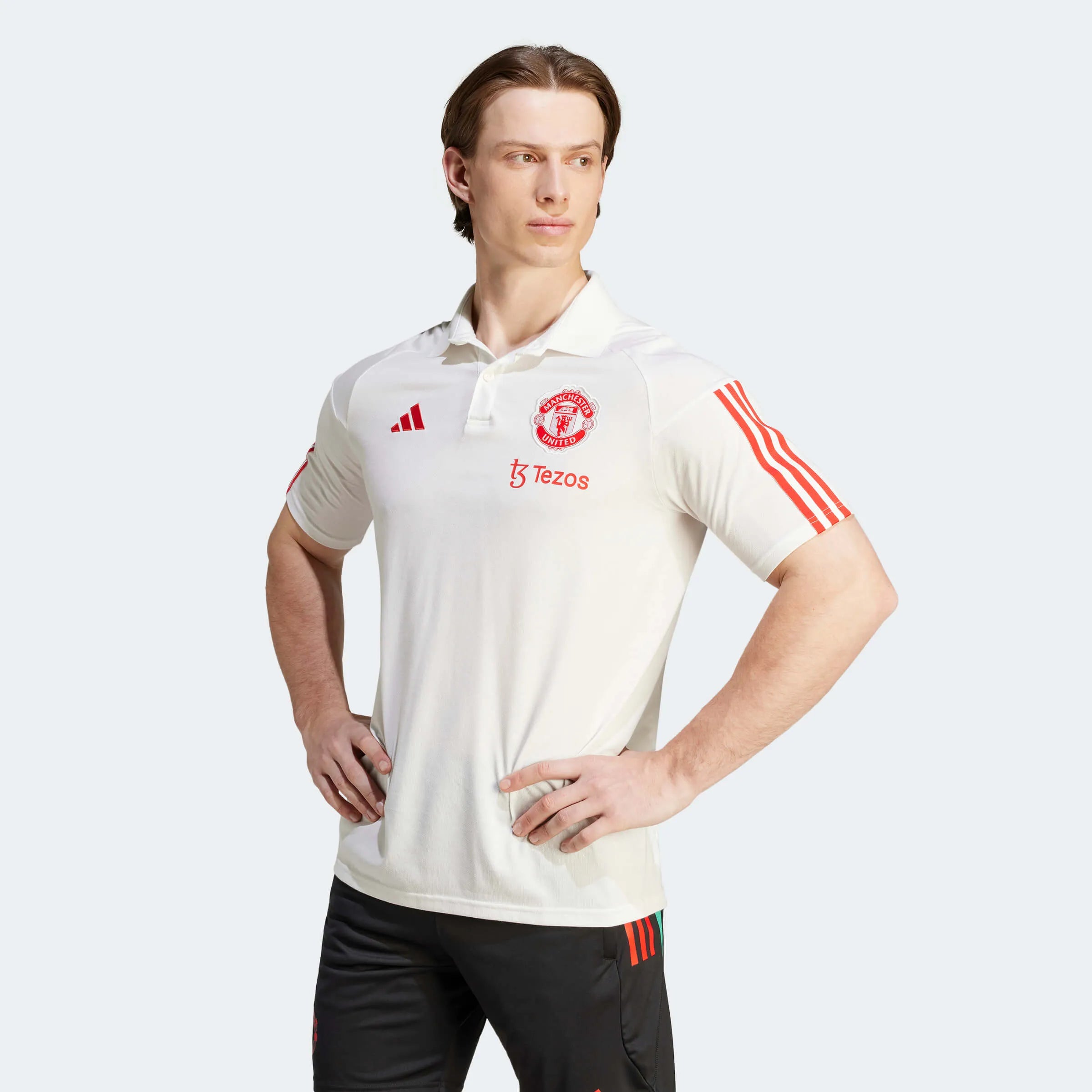 adidas 2023-24 Manchester United Men's Tiro 23 Polo Shirt (Model - Front)