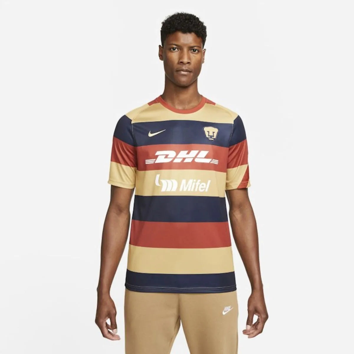 Nike 2021-22 Pumas Pre-Match Jersey - Firewood Orange-Navy-Gold (Model - Front)