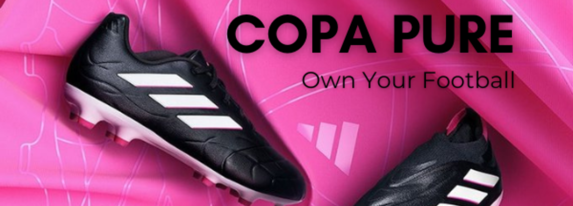 adidas Copa Pure soccer shoes in black and pink with pink background