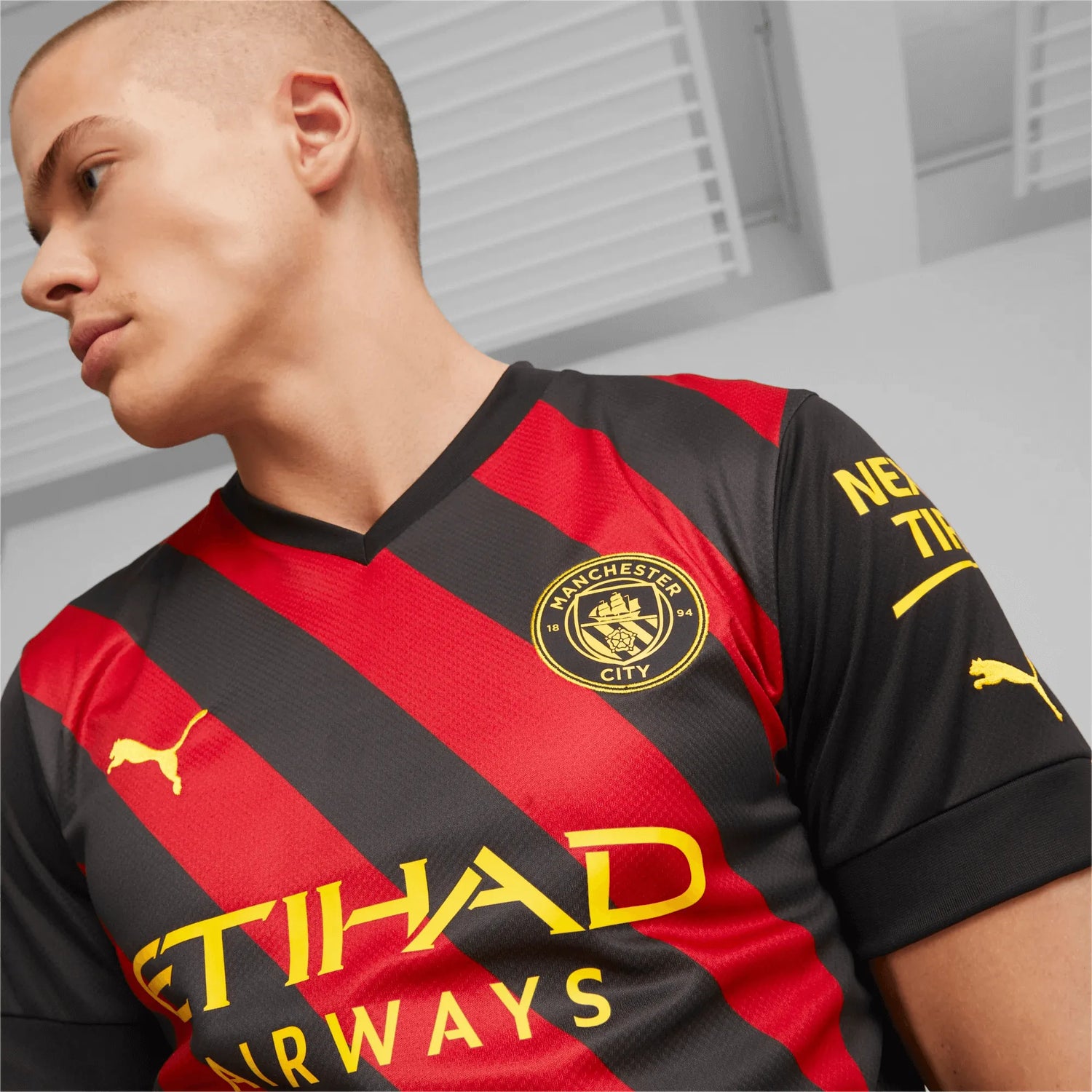 Puma 2022-23 Manchester City Away Jersey - Black-Red (Detail 1)