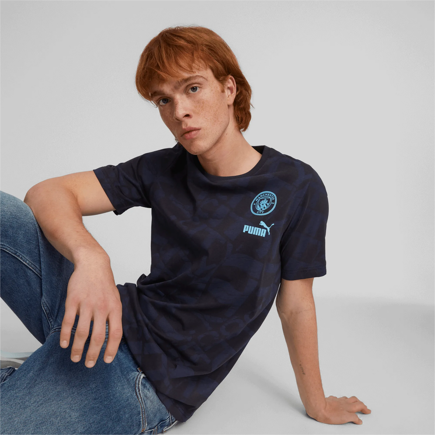Puma 2023-24 Manchester Ftbl Core AOP Tee (Model - Front)