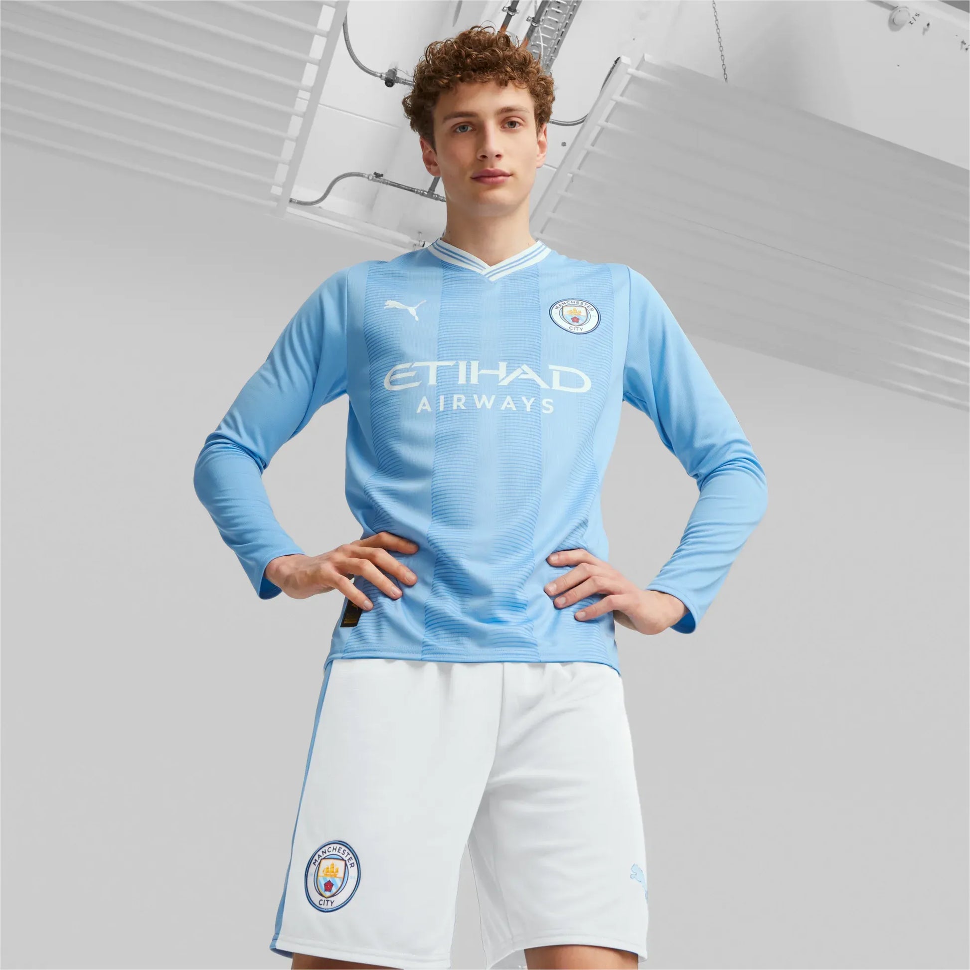 Puma 2023-24 Manchester City Men's Stadium Home Long-Sleeve Jersey (Model - Front)