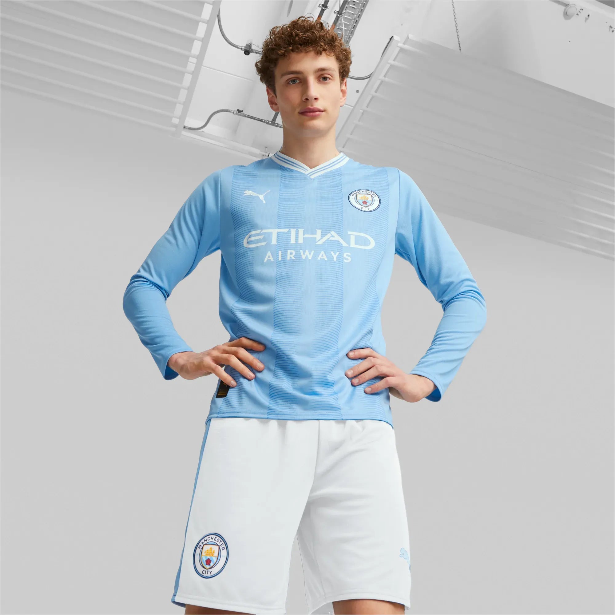 Puma 2023-24 Manchester City Men's Stadium Home Long-Sleeve Jersey (Model - Front)