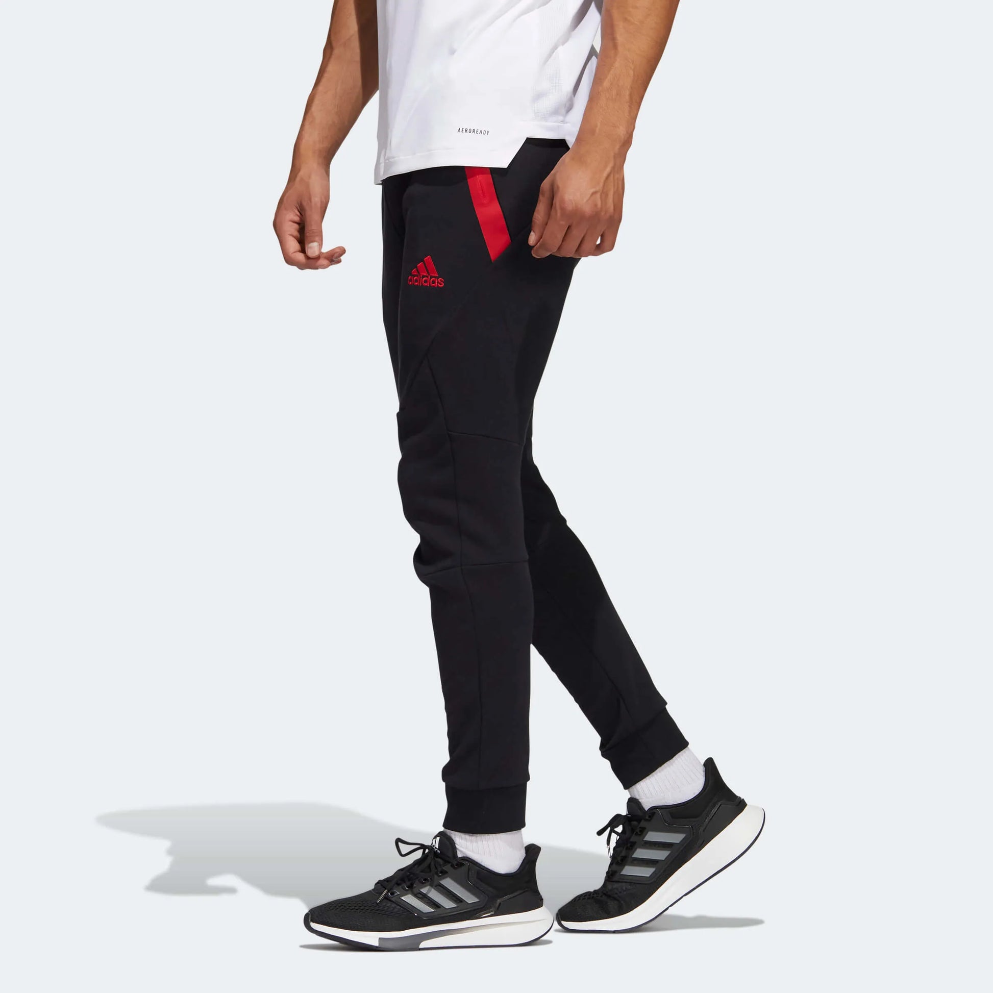 adidas 2022-23 Manchester United Travel Pants - Black-Red (Model - Side 1)