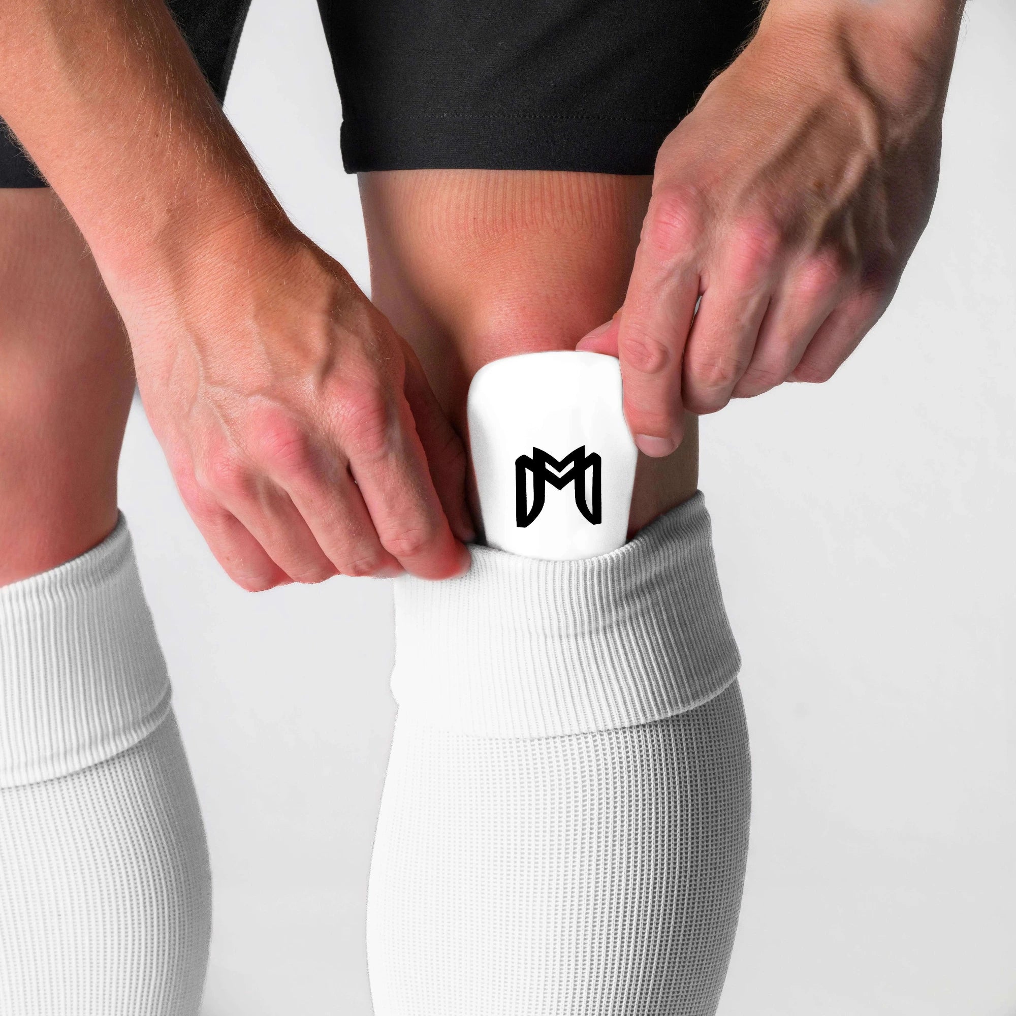 MEDICAPTAIN Mini Shin Guards White (Model - Front).webp