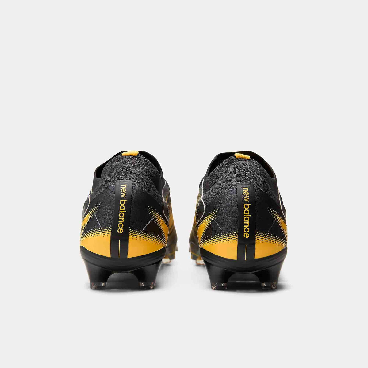 New Balance Tekela Elite Low Laced V5 2E Wide Firm Ground Soccer Cleats - The Catalyst Pack (FA26) (Pair - Back)
