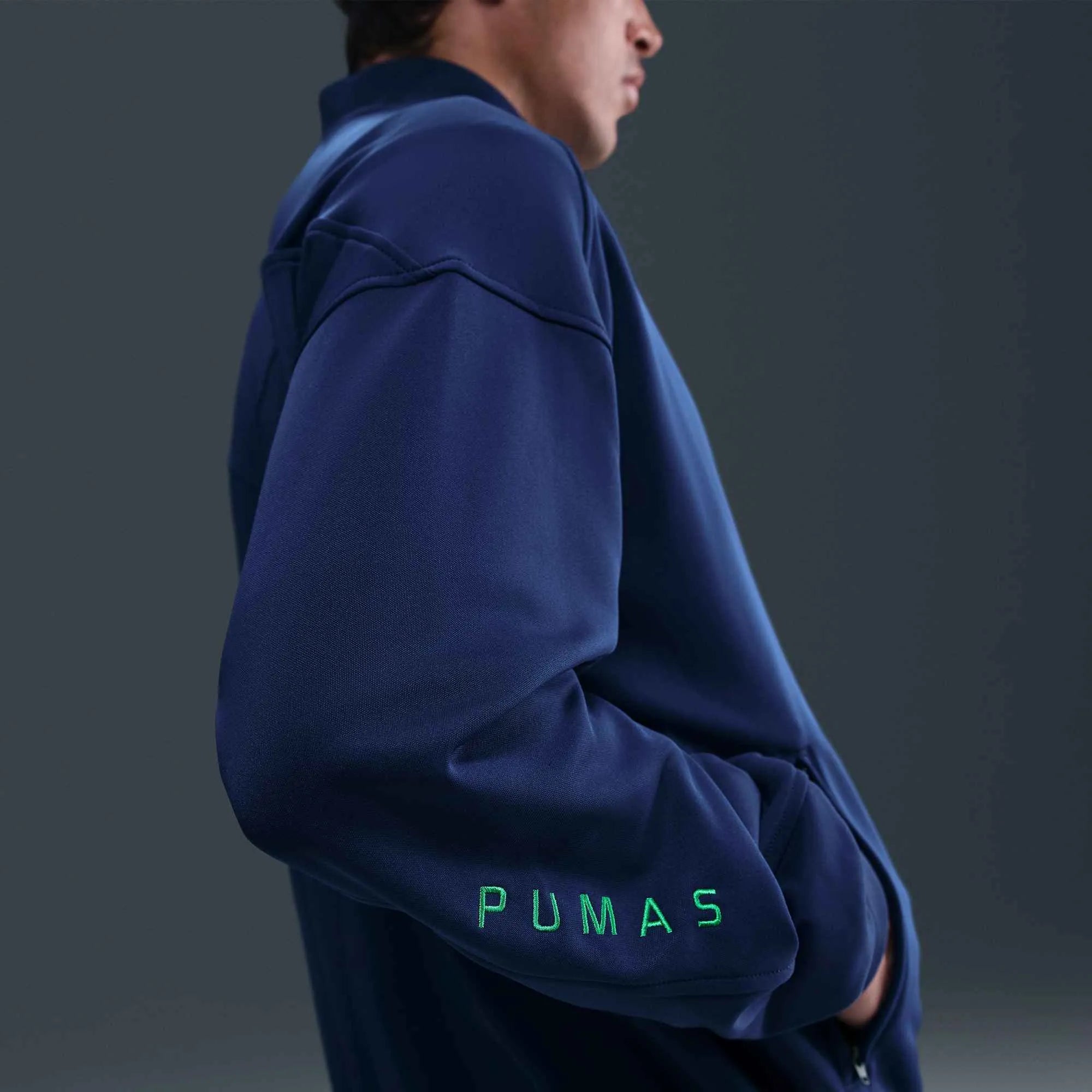 Nike 2025-26 Pumas Men's Academy Pro Anthem Jacket Blue Void/Green Shock/Green Shock (Detail 3)