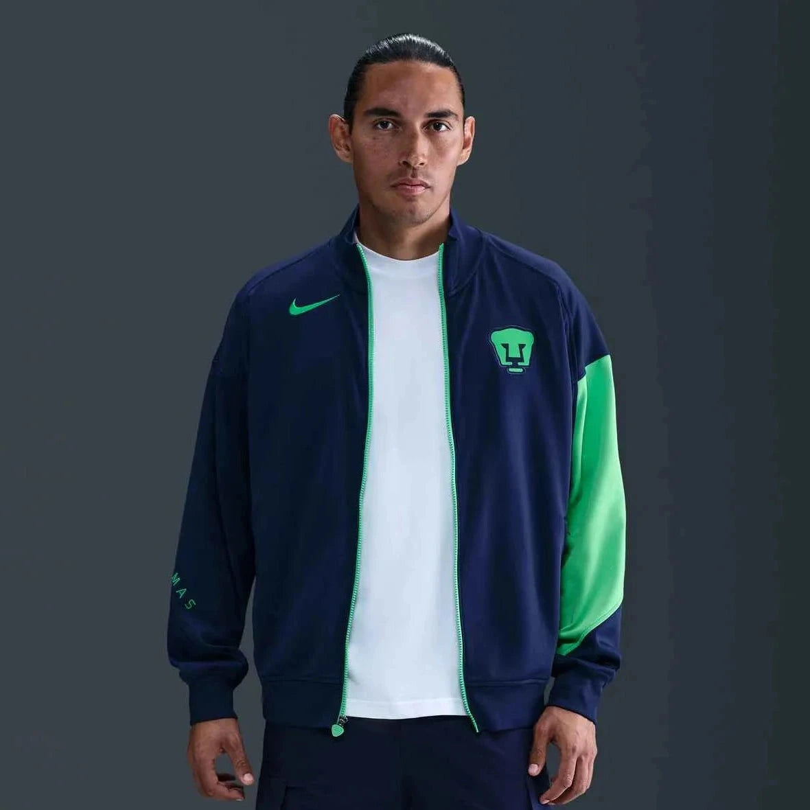 Nike 2025-26 Pumas Men's Academy Pro Anthem Jacket Blue Void/Green Shock/Green Shock (Model - Front)