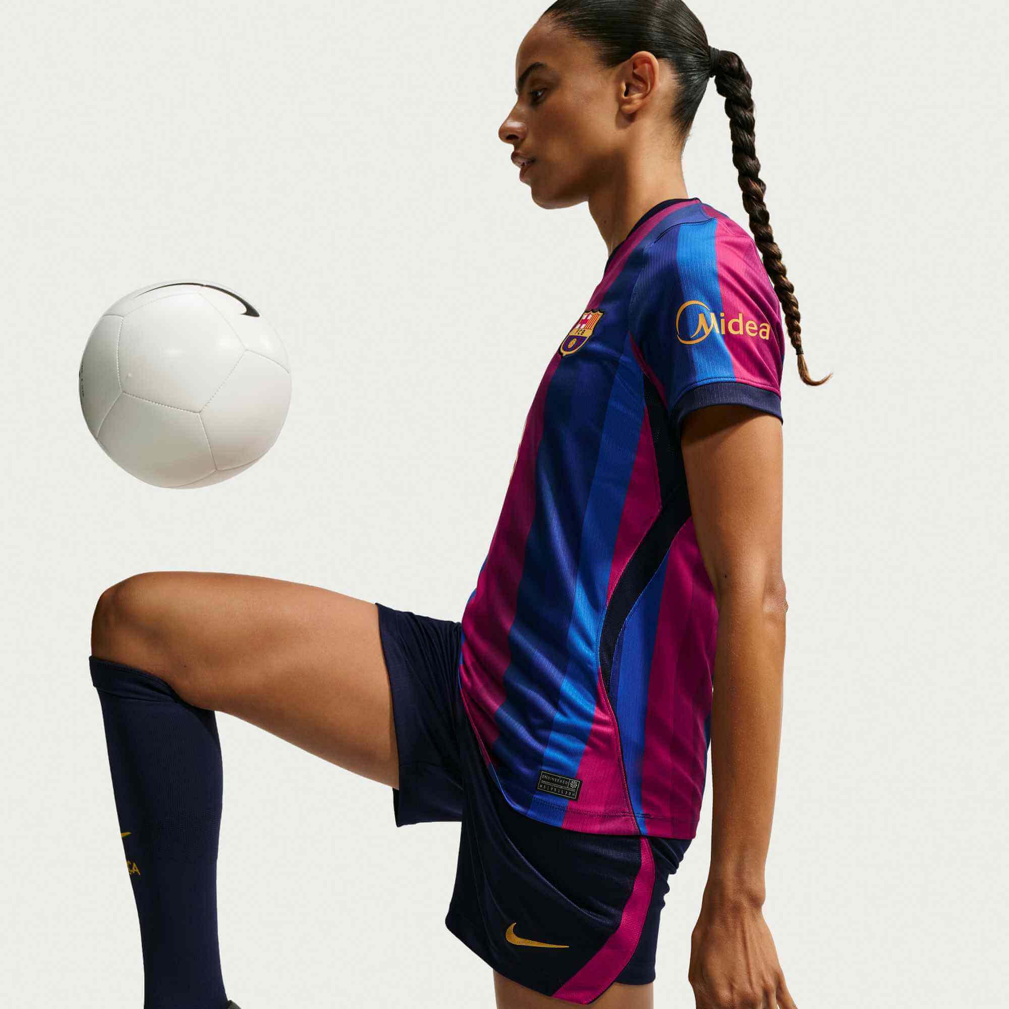 Nike 2026-27 Barcelona Women's Stadium Home Soccer Jersey (Model - Side)