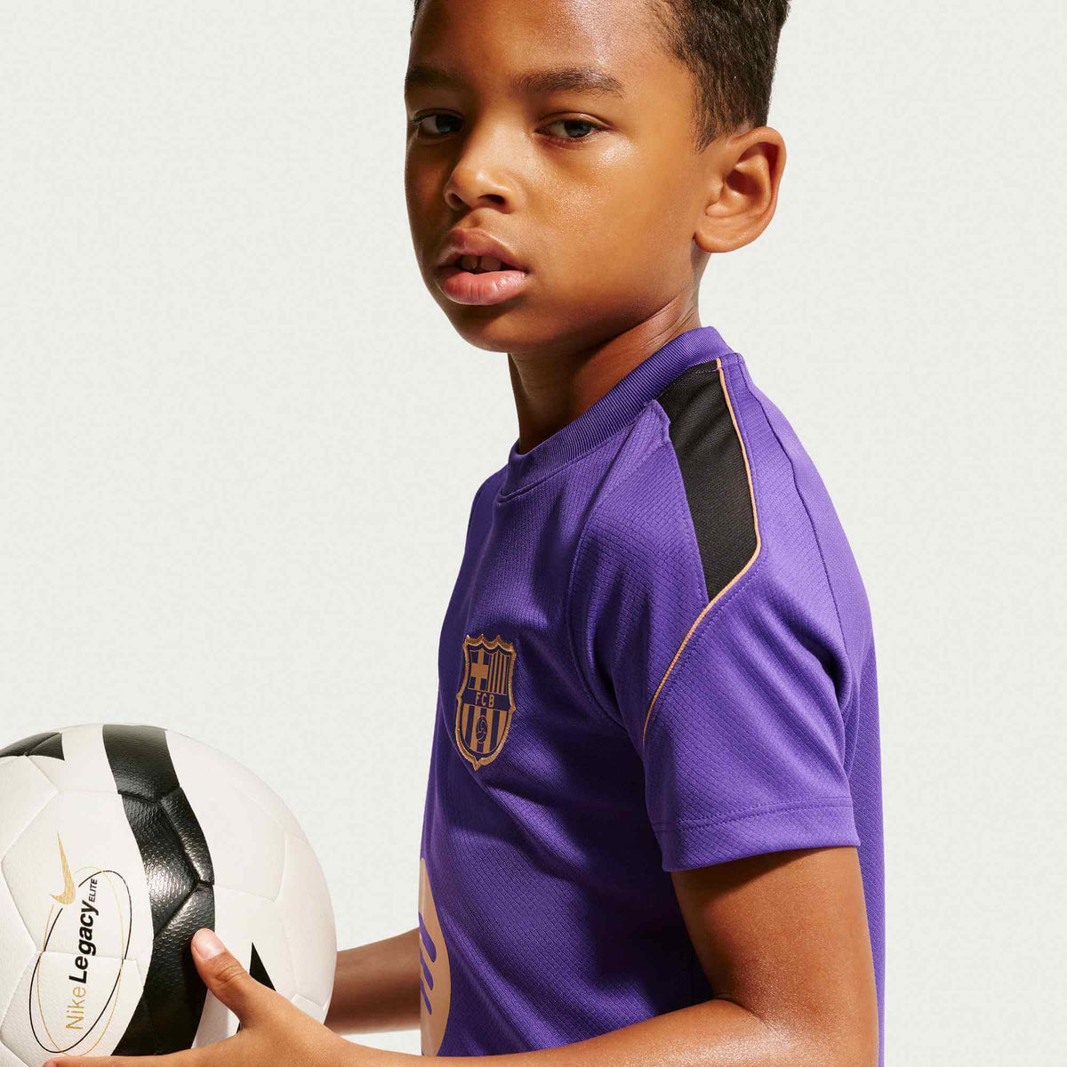 Nike 2026-27 Barcelona Youth Away Dri-Fit Strike Top (Model 2 - Side)