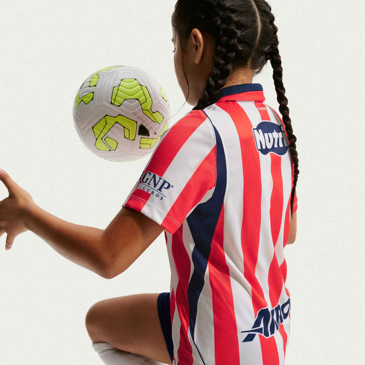 Nike 2026-27 Chivas Youth Stadium Home Soccer Jersey (Model - Side)