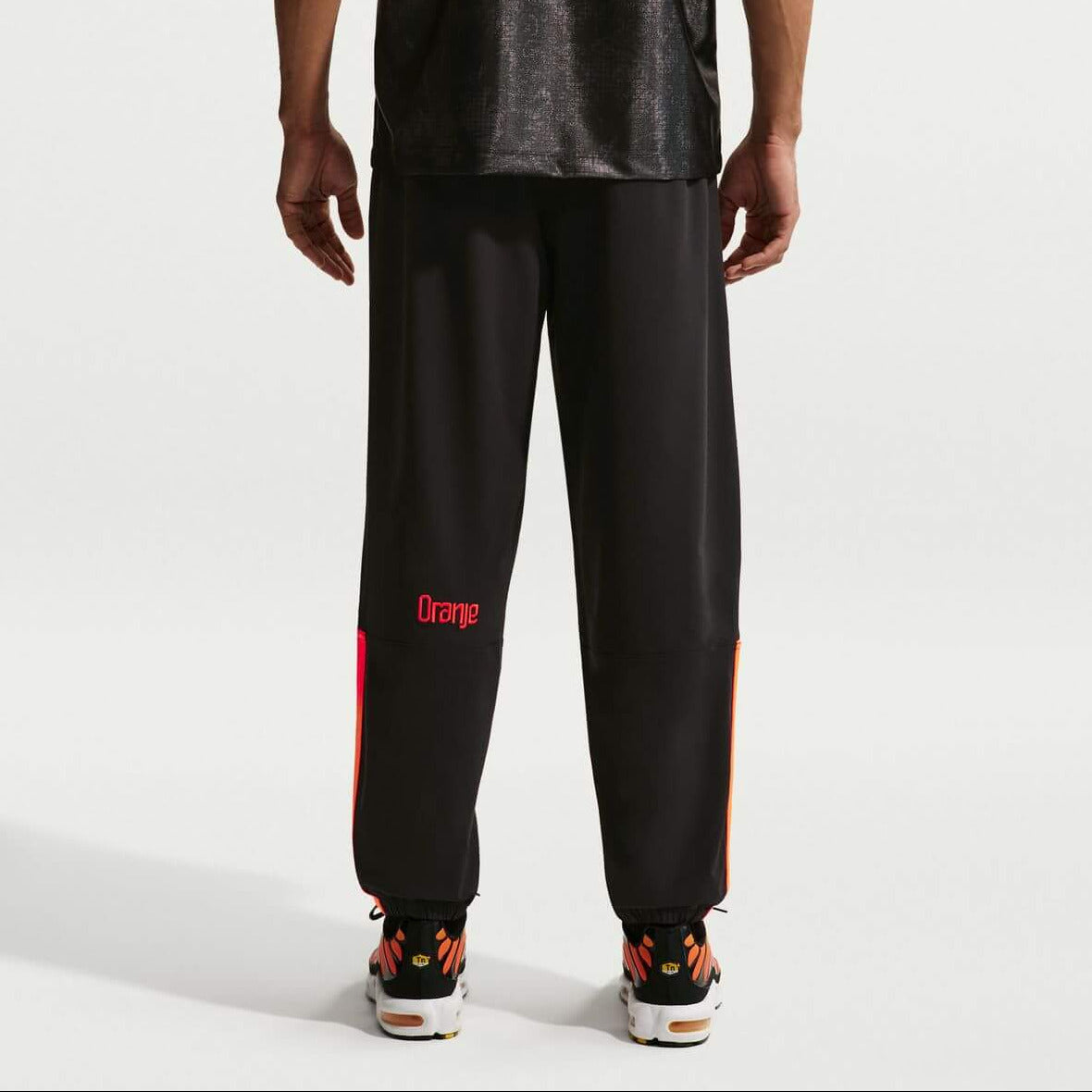 Nike 2026 Netherlands Men's Dri-Fit Energy Woven Pants (Model - Back)