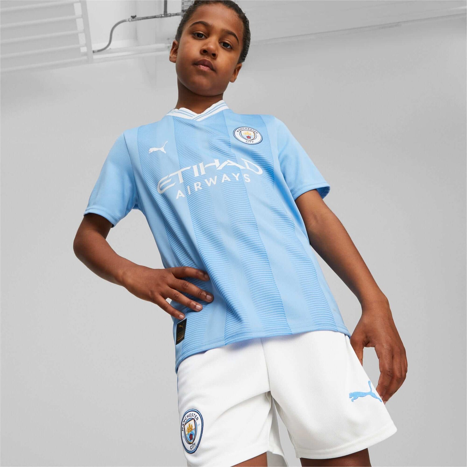 Puma 2023-24 Manchester City Youth Stadium Home Jersey (Model - Front)