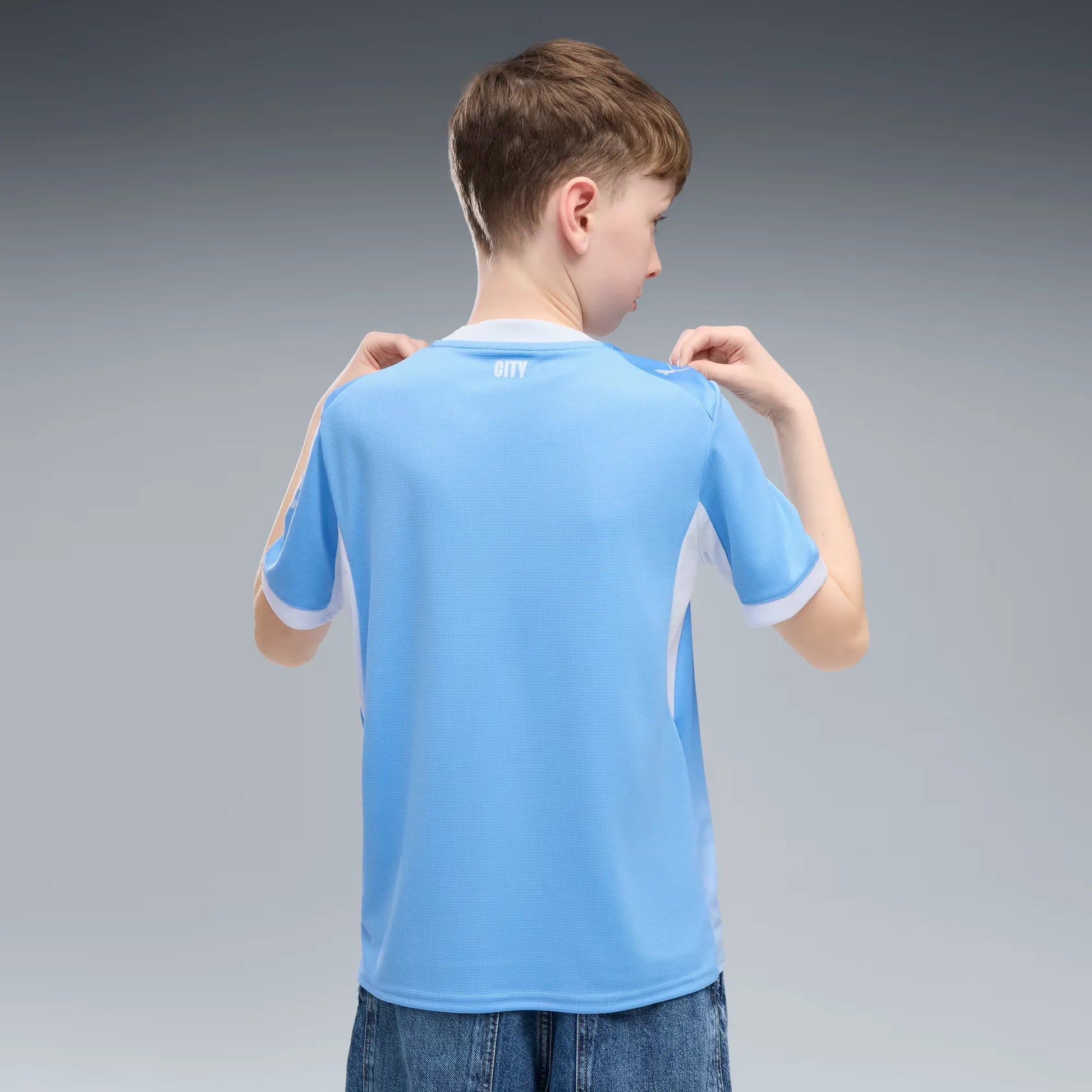 Puma 2026-27 Manchester City Youth Stadium Home Soccer Jersey (Model - Back)