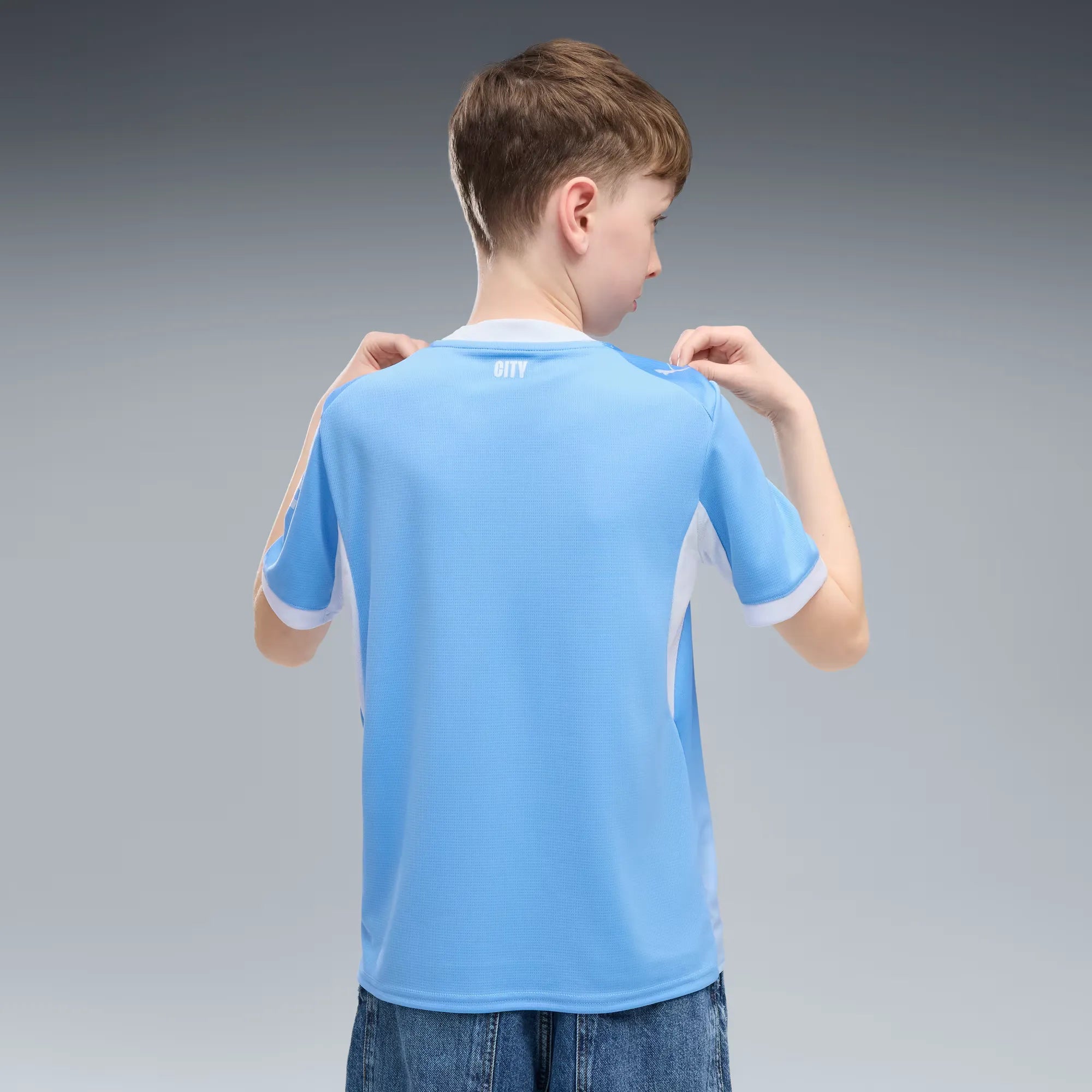 Puma 2026-27 Manchester City Youth Stadium Home Soccer Jersey (Model - Back)