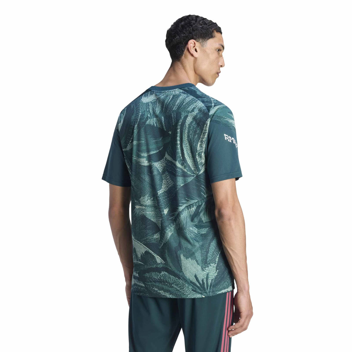 adidas 2026-27 Real Madrid Men's Pre-Match Soccer Jersey Aurora Ivy / Semi Green Spark (Model - Back)