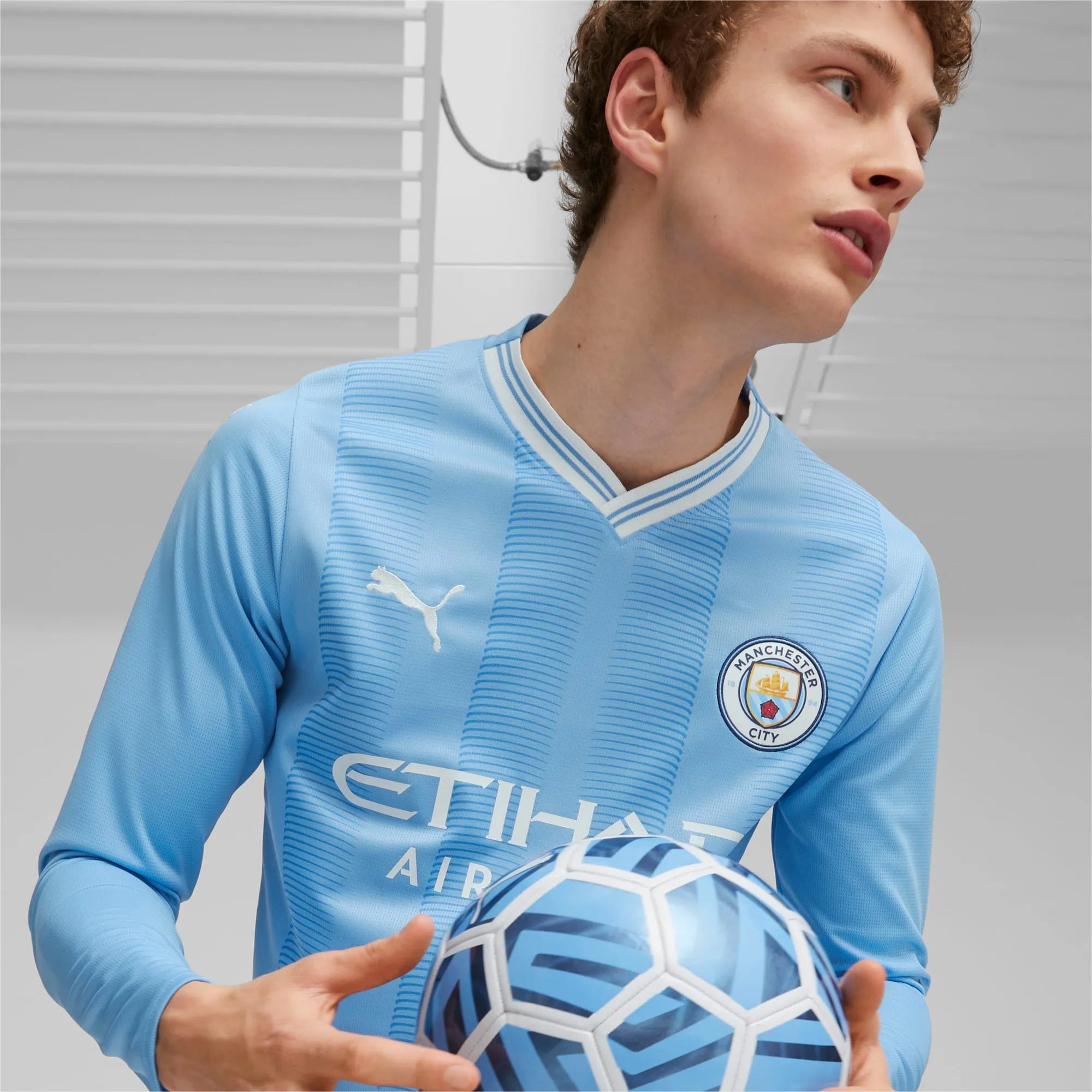 Puma 2023-24 Manchester City Men's Stadium Home Long-Sleeve Jersey (Detail 1)