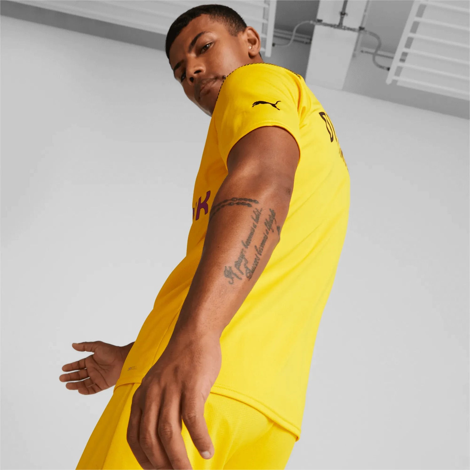 Puma 2022-23 Borussia Dortmund Cup Jersey - Cyber Yellow (Model - Back)
