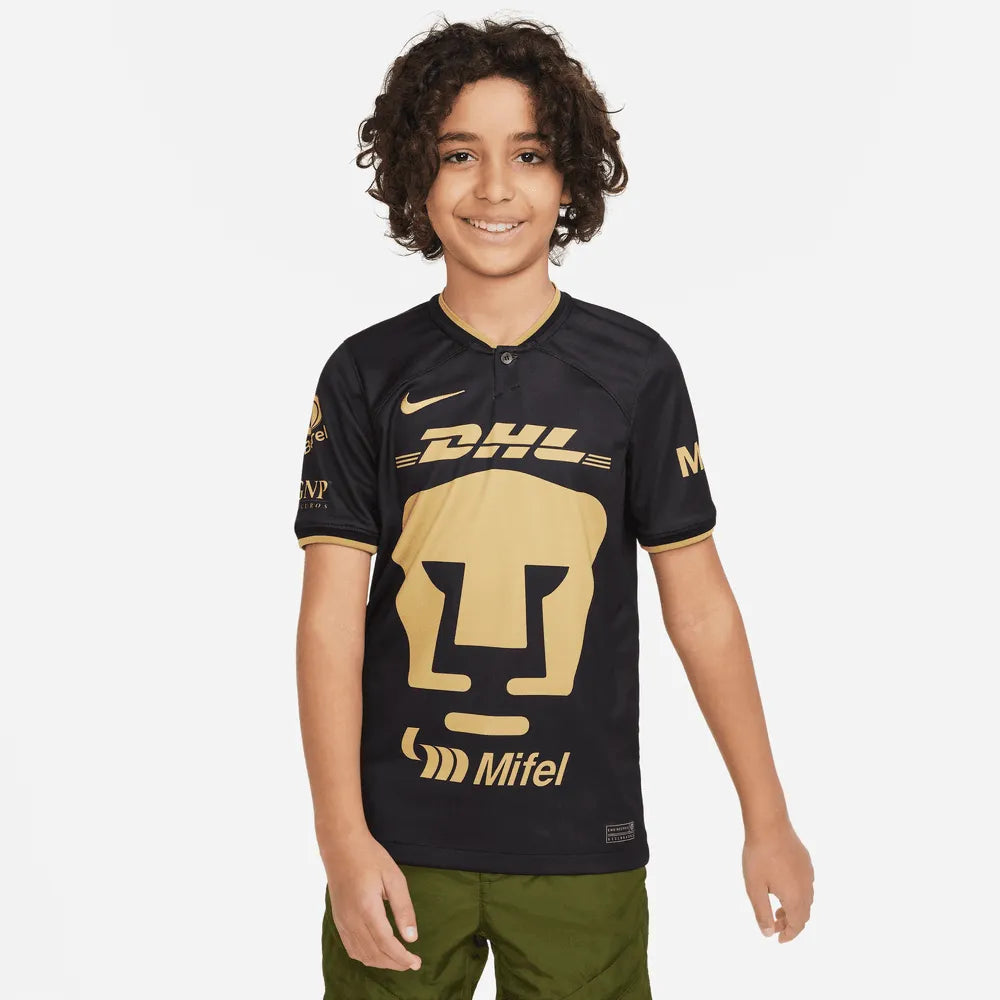 Nike 2023 Pumas Kids Third Jersey - Black - Gold (Model - Front)