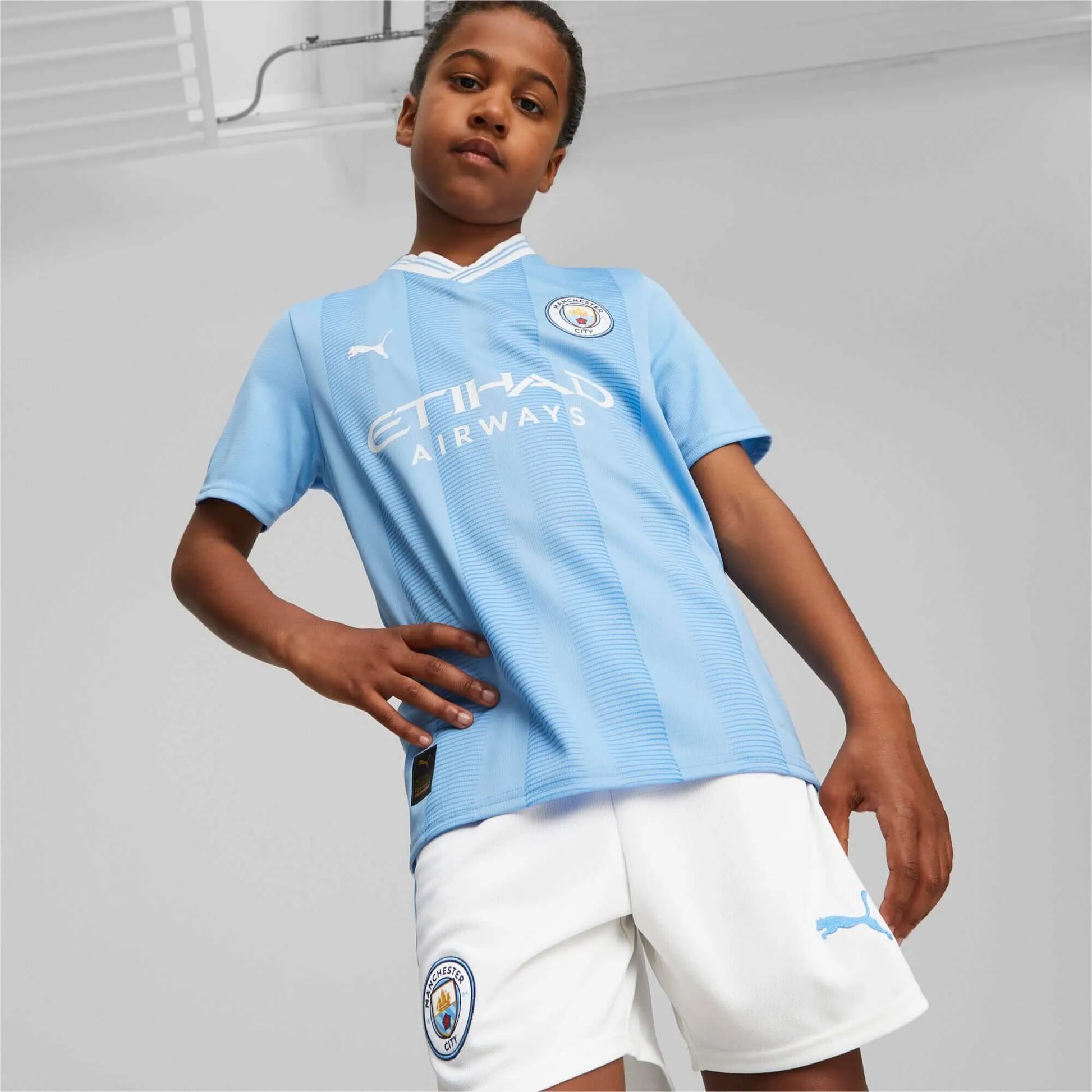Puma 2023-24 Manchester City Youth Stadium Home Jersey (Model - Front)