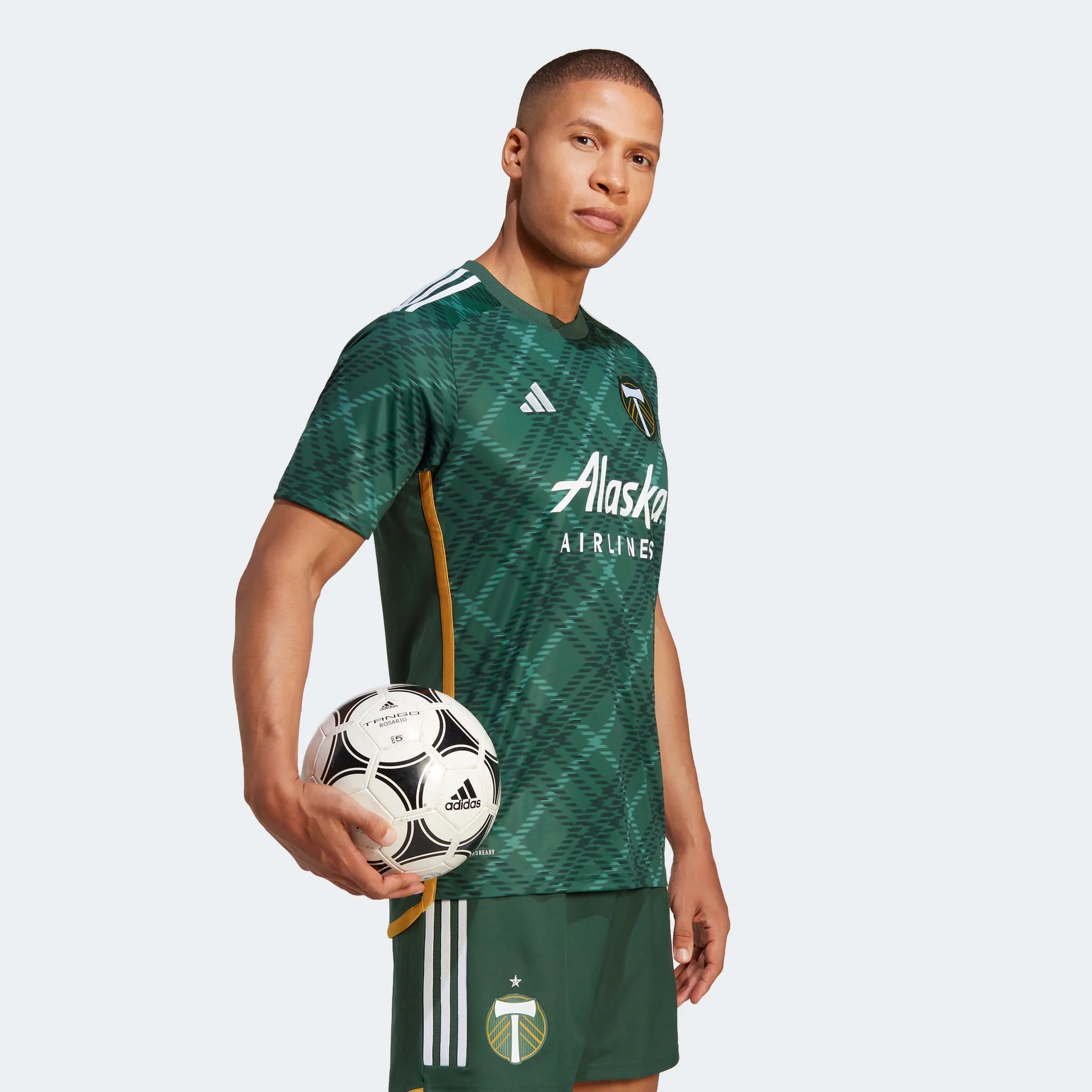 adidas 2023-24 Portland Timbers Men's Stadium Home Jersey (Model - Side)