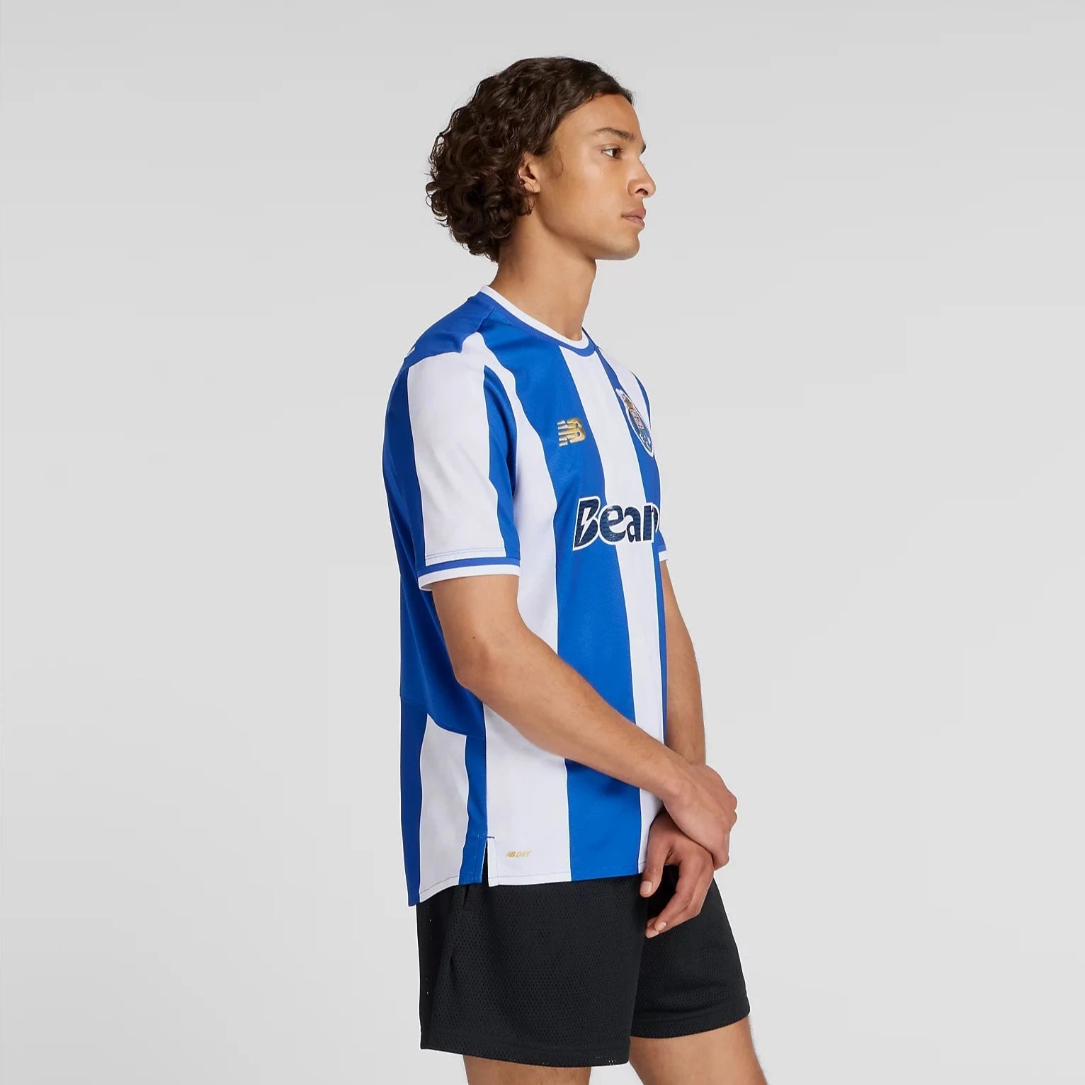 New Balance 2025-26 Porto Men's Stadium Home Soccer Jersey (Model - Side)