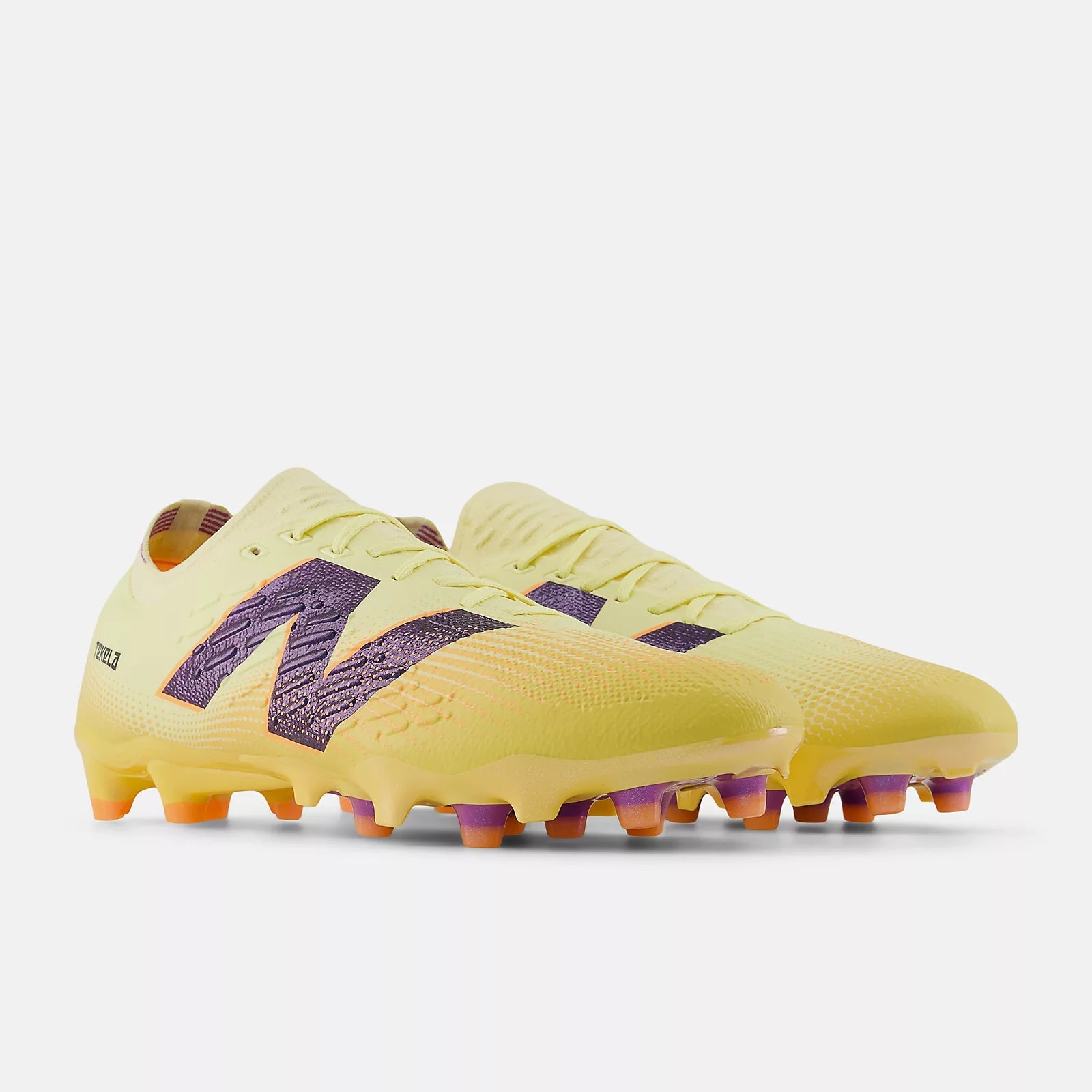 New Balance Tekela Pro Low Laced V4+ Firm Ground Soccer Cleats - Energy Rush Pack (SP25) (Pair - Lateral)
