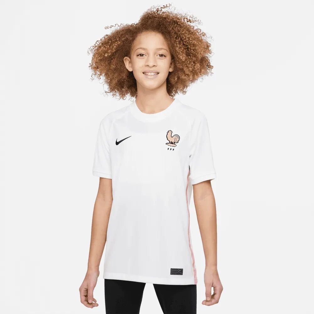 Nike 2022-23 France Away Youth Jersey White-Pink Glaze-Blue (Model - Front)