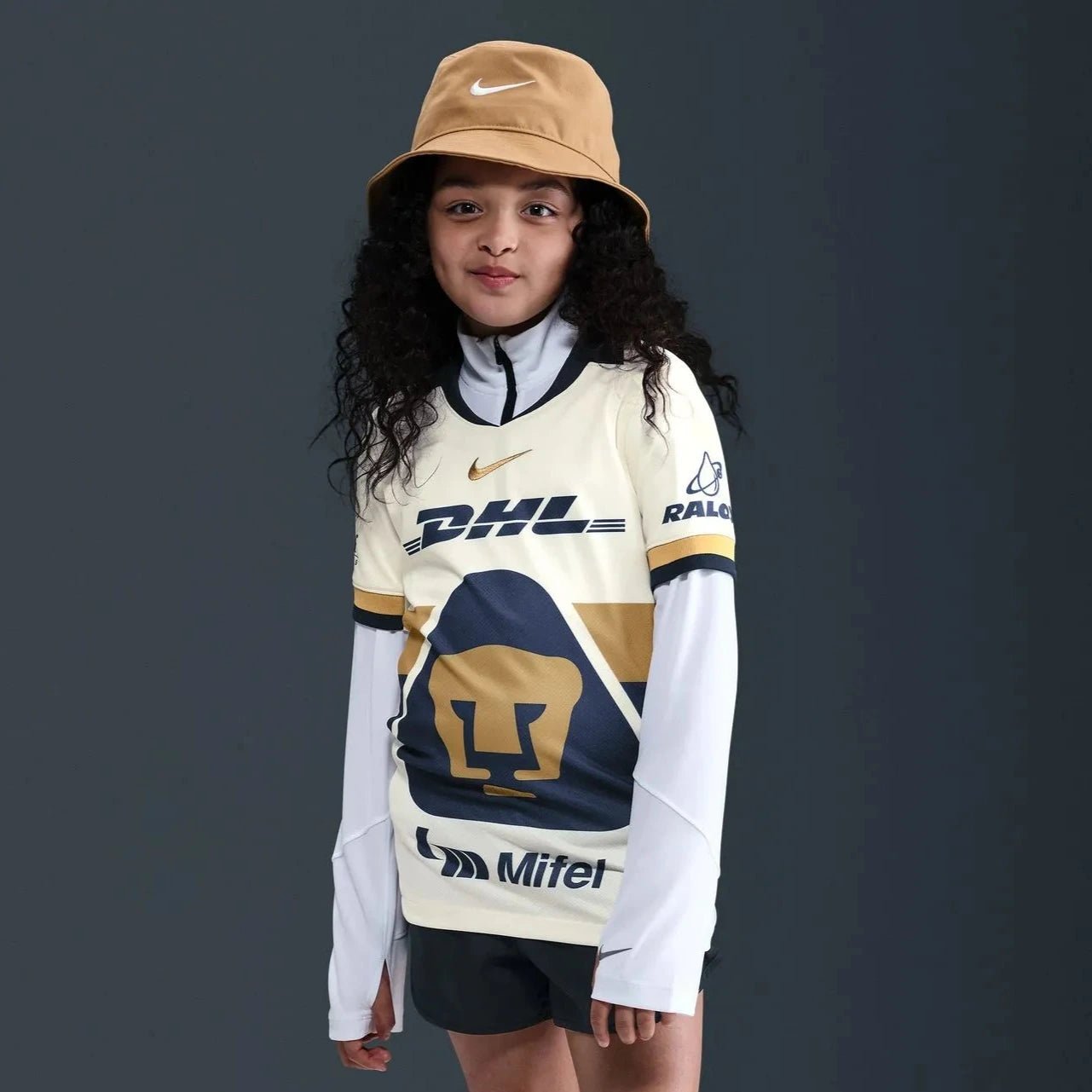 Nike 2025-26 Pumas Youth Stadium Home Soccer Jersey (Model - Front)