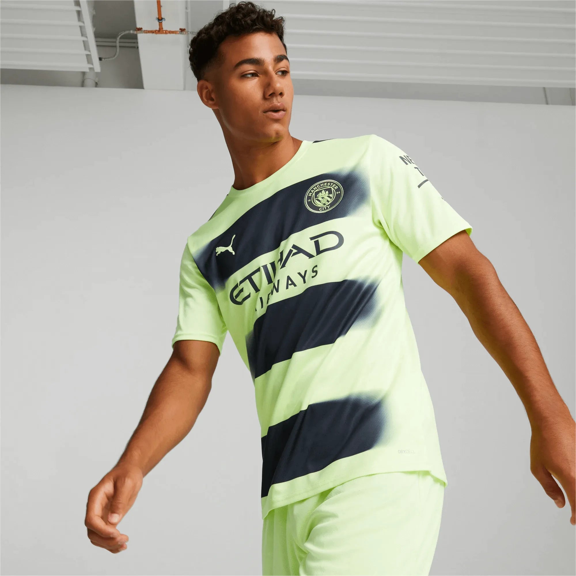 Puma 2022-23 Manchester City Third Jersey - Fizzy Light-Parisian Night