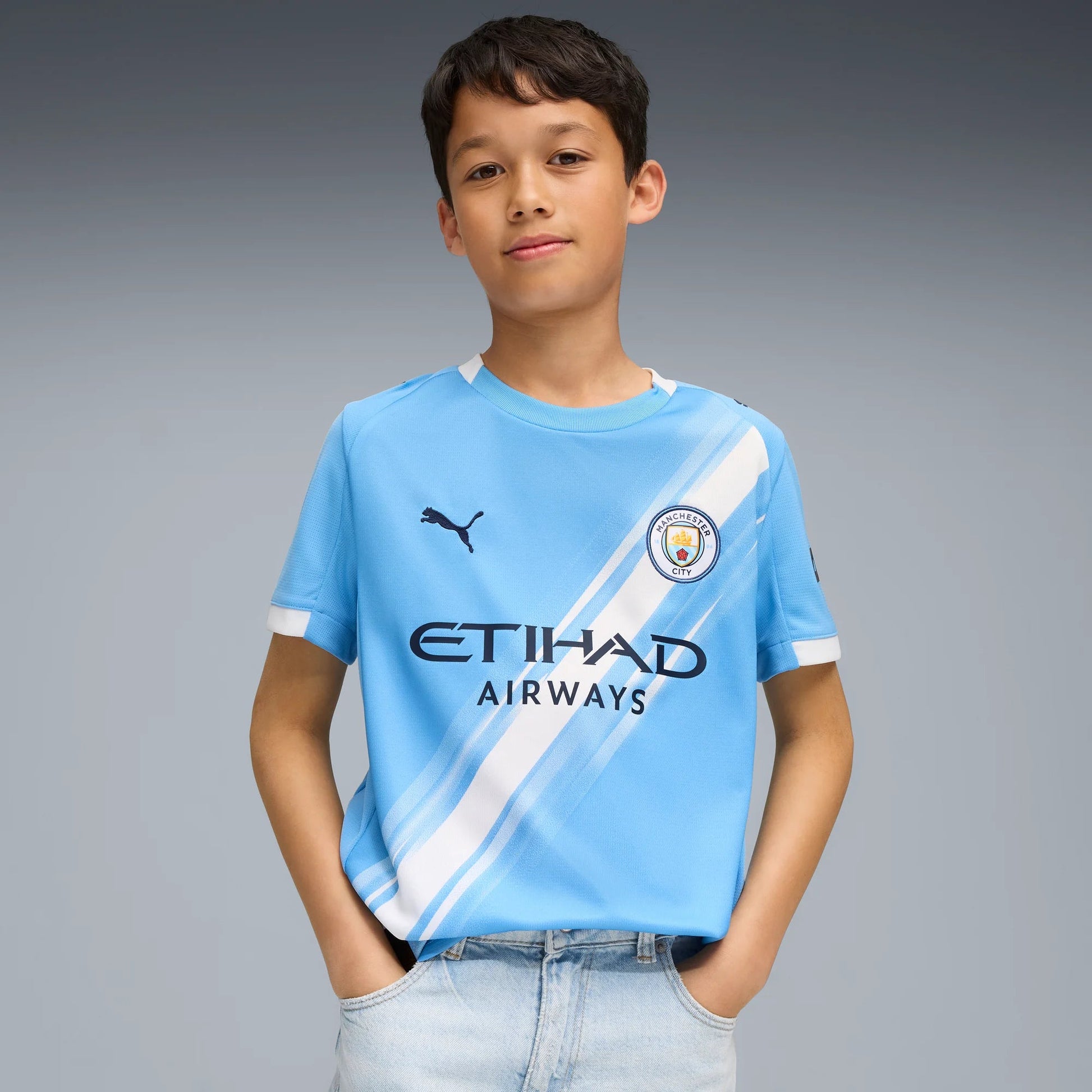 Puma 2025-26 Manchester City Youth Stadium Home Soccer Jersey (Model - Front)
