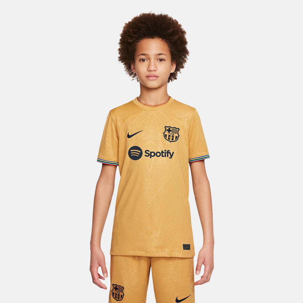Nike 2022-23 FC Barcelona Youth Away Jersey - Club Gold-Obsidian (Model - Front)