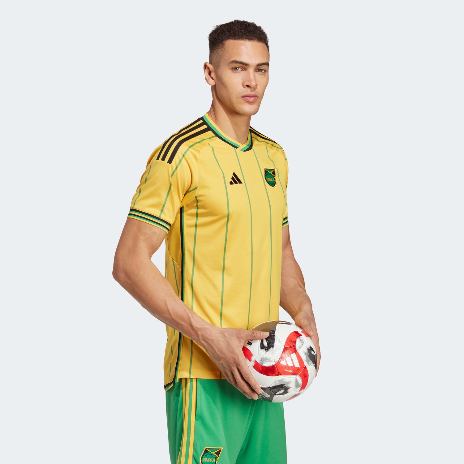adidas 2023 Jamaica Home Jersey - Bold Gold-Vivid Green (Model - Side)