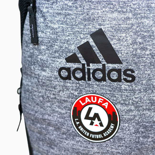close up of adidas logo and LAUFA logo on adidas LAUFA Stadium 3 Backpack - Onix Grey