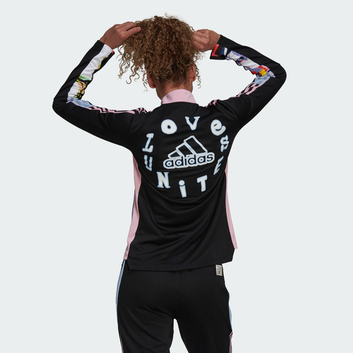 Adidas Love Unites Women Tiro Track Jacket - Black-Pink-Light Blue (Model - Back)